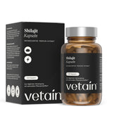 Vetains Shilajit Kapseln im hochwertigen Braunglas. Schräg dahinter der nachhaltige Verpackungskarton.