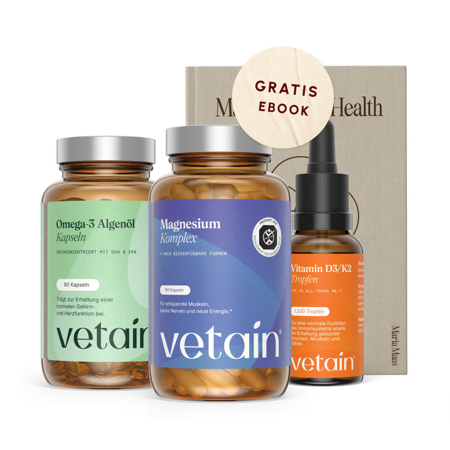 Vetain Daily Essentials Bundle: Omega-3 Algae Oil Capsules, Magnesium Complex, and Vitamin D3/K2 Drops in brown glass bottles with silver caps, behind them the book "Master Your Health" with "Free Ebook" badge