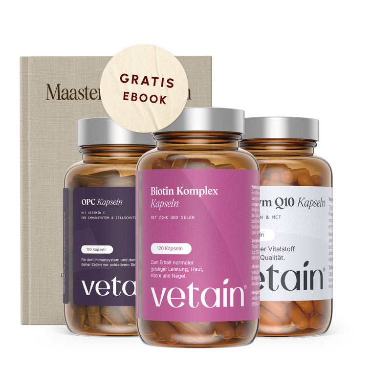 Vetain Inner Beauty Bundle: OPC capsules, Biotin Complex capsules, and Coenzyme Q10 capsules in brown glass bottles with silver lids, behind them the book "Master Your Health" with "Free Ebook" badge