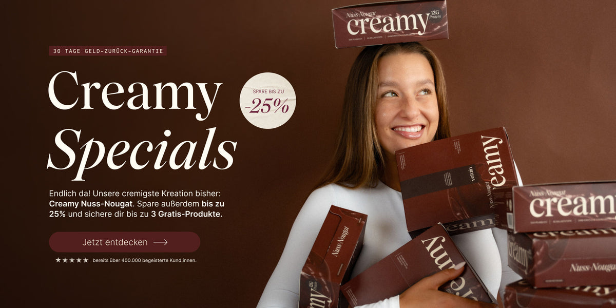 Vetain Creamy Specials Banner: lächelnde Frau mit mehreren Creamy Nuss-Nougat Verpackungen im Arm, dazu Hinweis auf bis zu 25 % Rabatt und 30 Tage Geld-zurück-Garantie.